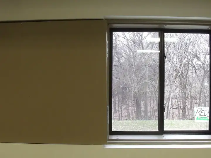 Storm-rated window inside a shelter