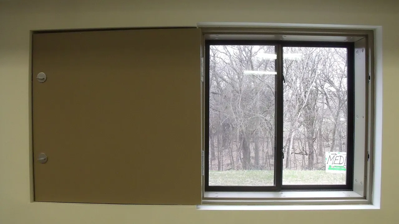 Storm-rated window inside a shelter